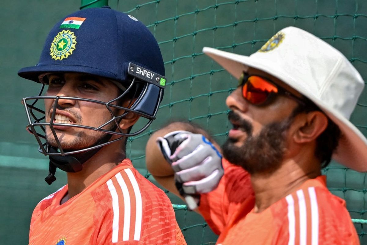 India batter Shubman Gill (L) and batting coach Vikram Rathour