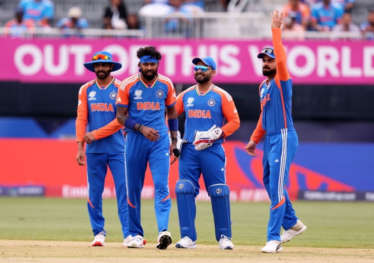 India cricketers celebrate the fall of an Ireland wicket in their match in the T20 World Cup 2024.