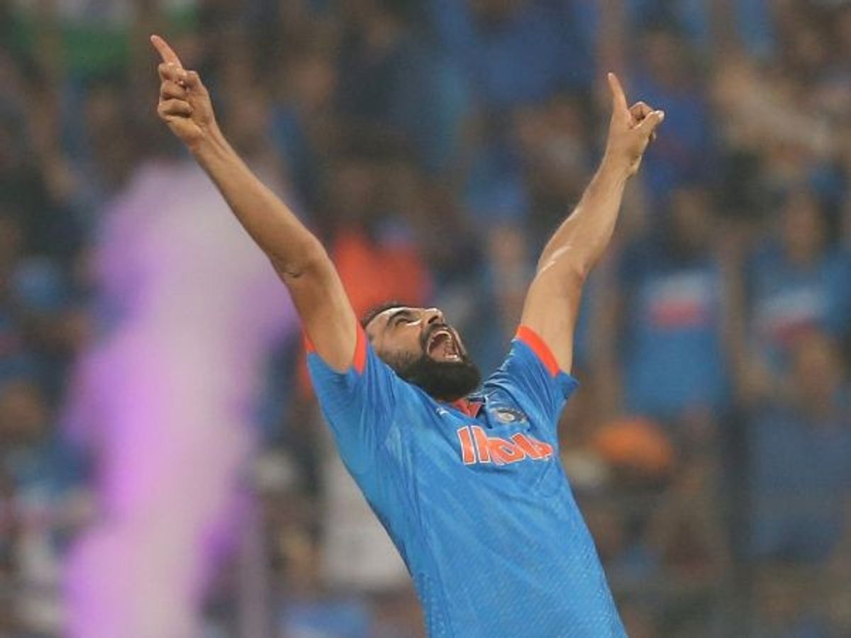 India pacer Mohammed Shami celebrates taking a New Zealand wicket in the first semi-final of World Cup 2023