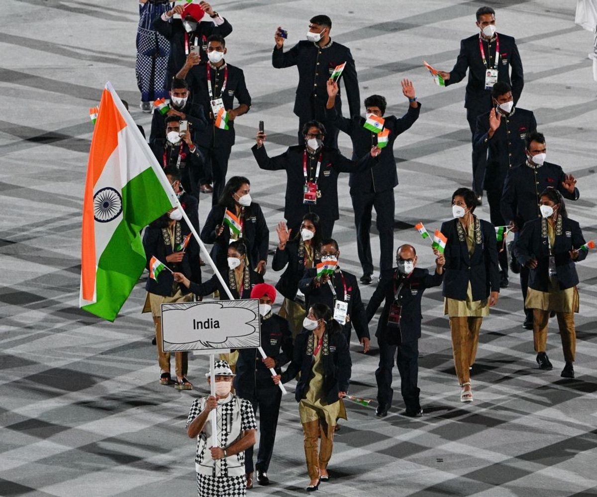 In pictures: Tokyo Olympics kick off but without customary glitz