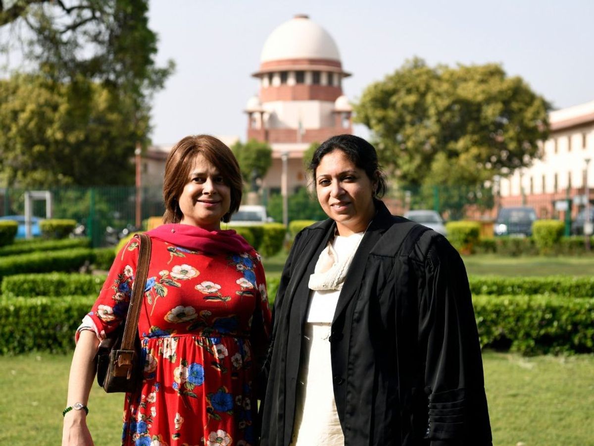 Indian actress Bobby Darling (L), who underwent gender transformation, with advocate Meera Kaura Patel in front of the Supreme Court of India