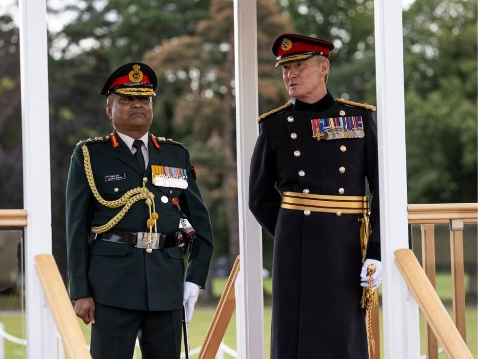 Indian Army chief General Manoj Pande (front right) inspects the Sovereign's Parade at the Royal Military Academy, Sandhurst, UK.