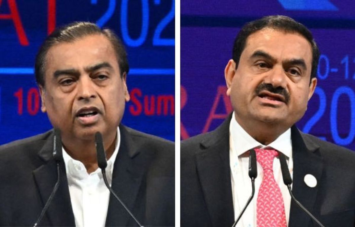 Indian businessmen Mukesh Ambani (L) and Gautam Adani