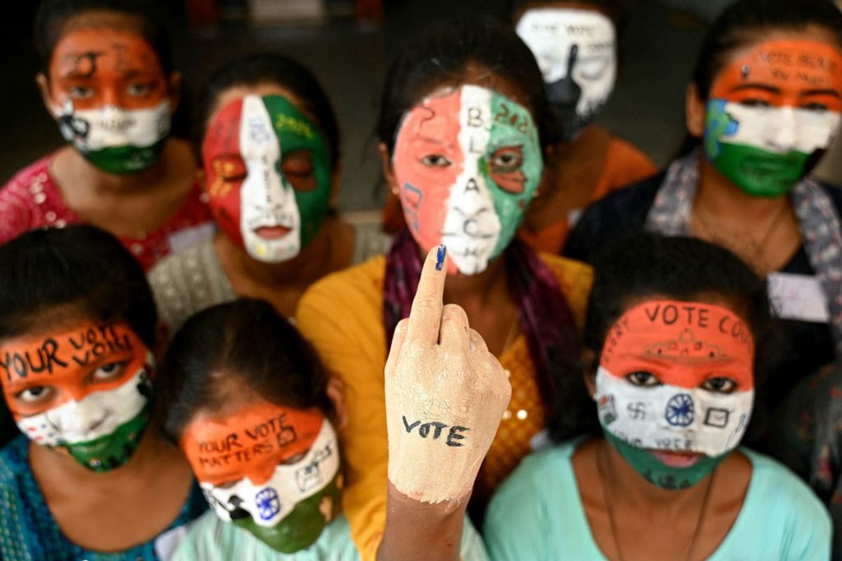 Indian college students spread awareness for first-generation voters during an election campaign ahead of India's upcoming national elections in Chennai in the southern state of Tamil Nadu