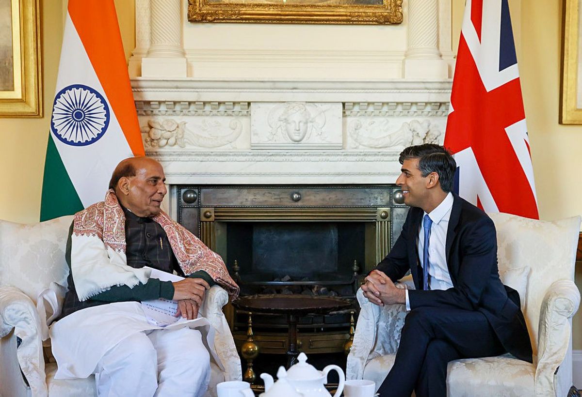 Indian defence minister Rajnath Singh interacts with British prime minister Rishi Sunak in London