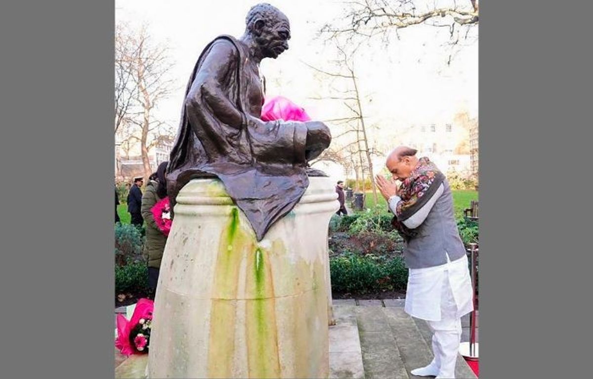 Indian defence minister Rajnath Singh pays homage to a statue of Mahatma Gandhi in Tavistock, London,