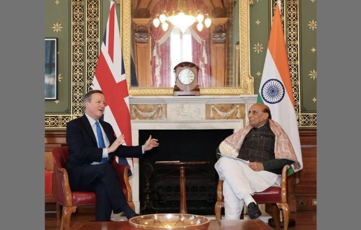 Indian defence minister Rajnath Singh with UK foreign secretary David Cameron