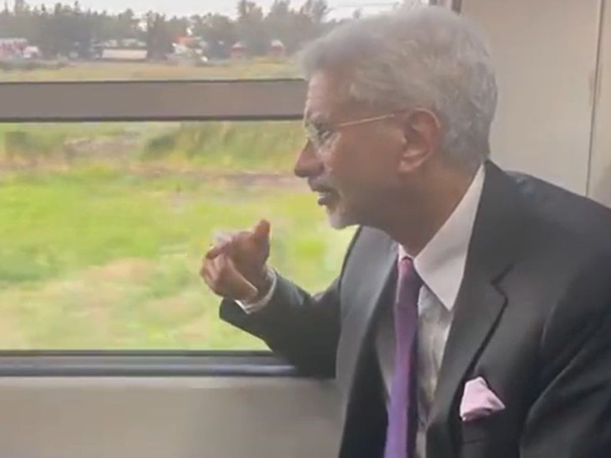 Indian external affairs minister Subrahmanyam Jaishankar speaks to Mozambican transport minister Mateus Magala (not in picture) while riding in a 'Made in India' train in Mozambique