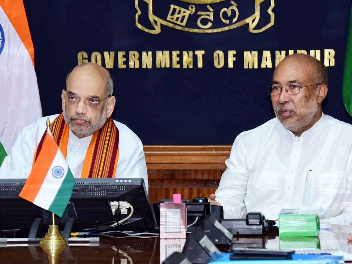 Indian home minister Amit Shah chairs a meeting with Manipur chief minister N Biren Singh in state capital Impha