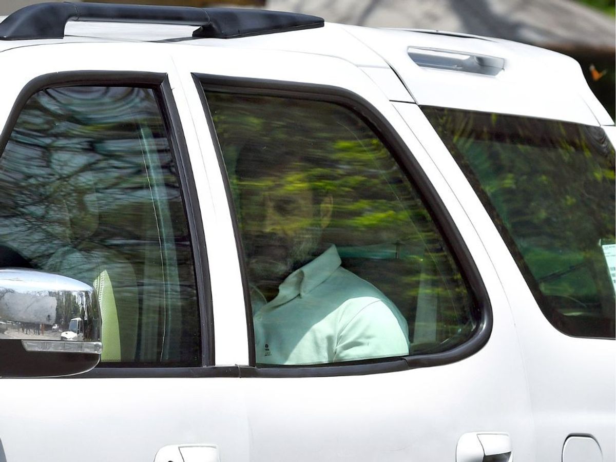 Indian National Congress leader Rahul Gandhi leaves from his official residence in New Delhi after being disqualified as a parliamentarian.
