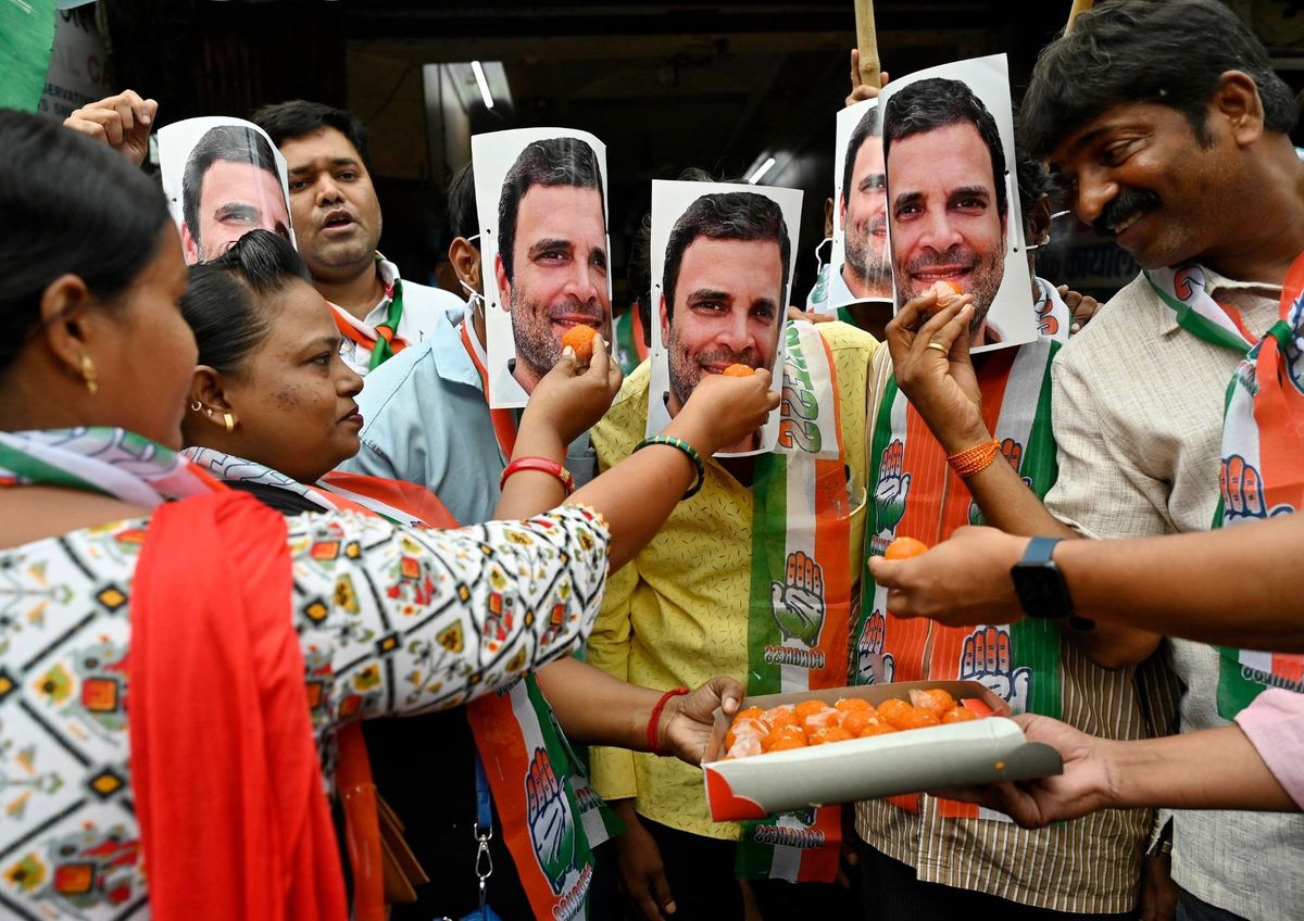 Indian National Congress workers and supporters celebrate after the Supreme Court of India stayed their leader Rahul Gandhi's conviction in a defamation case over 'Modi' surname remarks, in Mumbai, India,