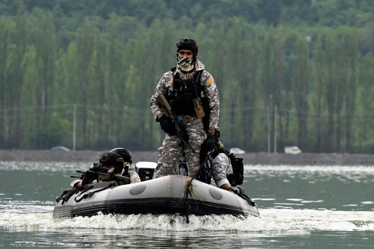 Indian Navy's Marine Commandos patrol in Dal Lake in Srinagar in India's Jammu and Kashmir
