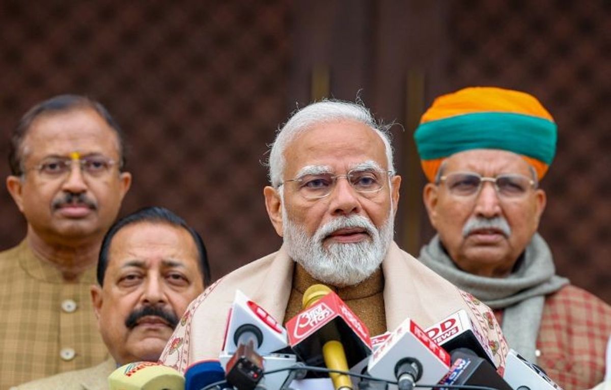 Indian PM Narendra Modi addresses the media on the first day of the interim budget session outside the new parliament in New Delhi