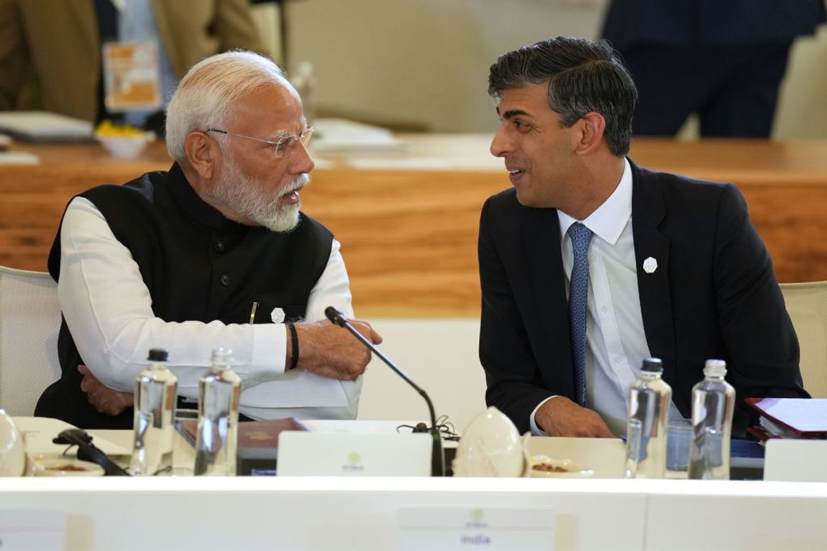 Indian PM Narendra Modi and his British counterpart Rishi Sunak speak at G7