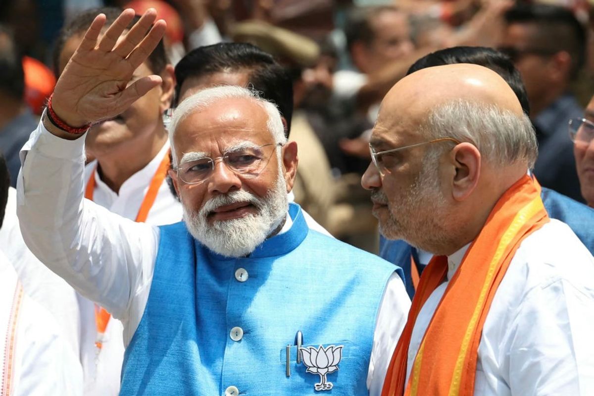 Indian PM Narendra Modi (L) with home minister Amit Shah