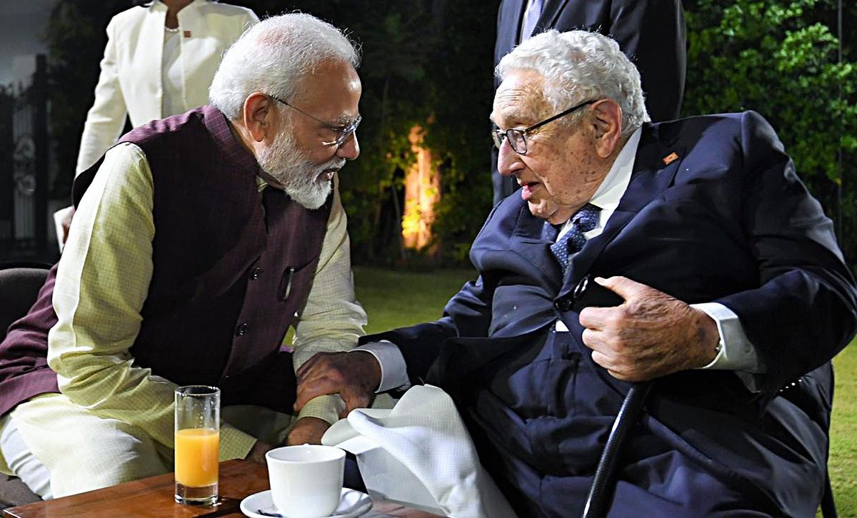 Indian PM Narendra Modi speaks with former US secretary of state Henry Kissinger