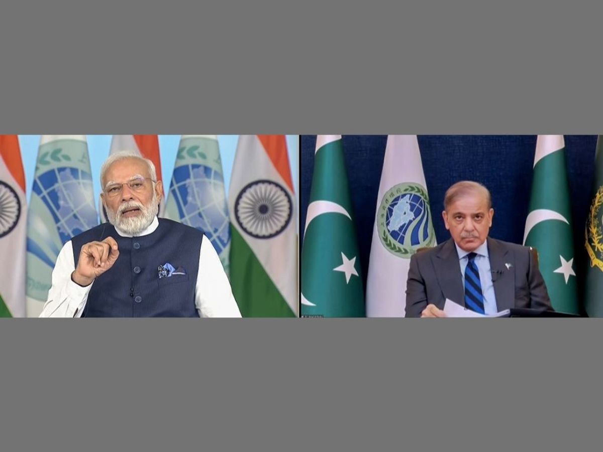 Indian prime minister Narendra Modi addresses at the Shanghai Cooperation Organisation (SCO) summit via video conference, in New Delhi. Pakistan prime minister Shezbaz Sharif is also seen.