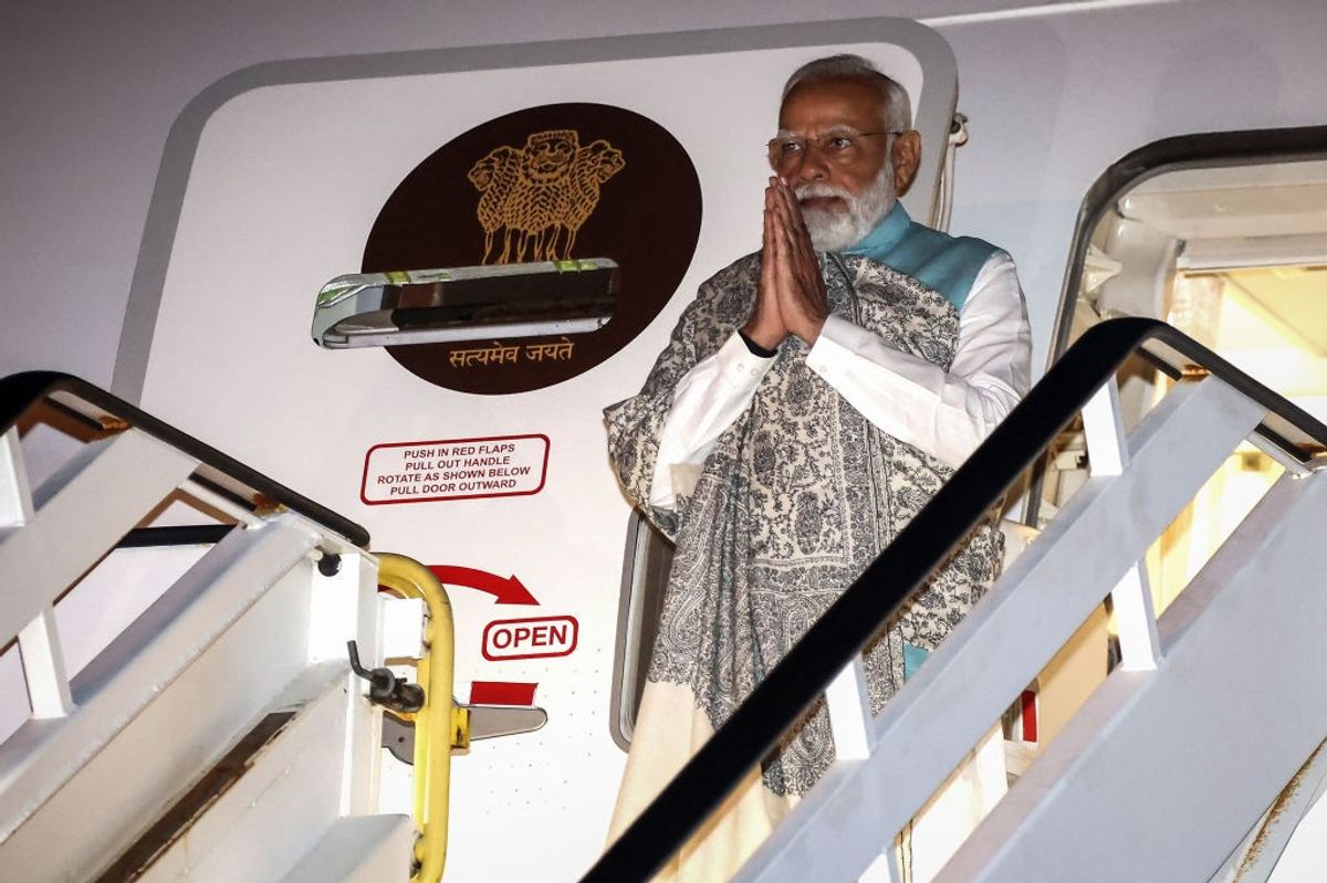 Indian prime minister Narendra Modi alights from his aircraft at the Sydney international airport