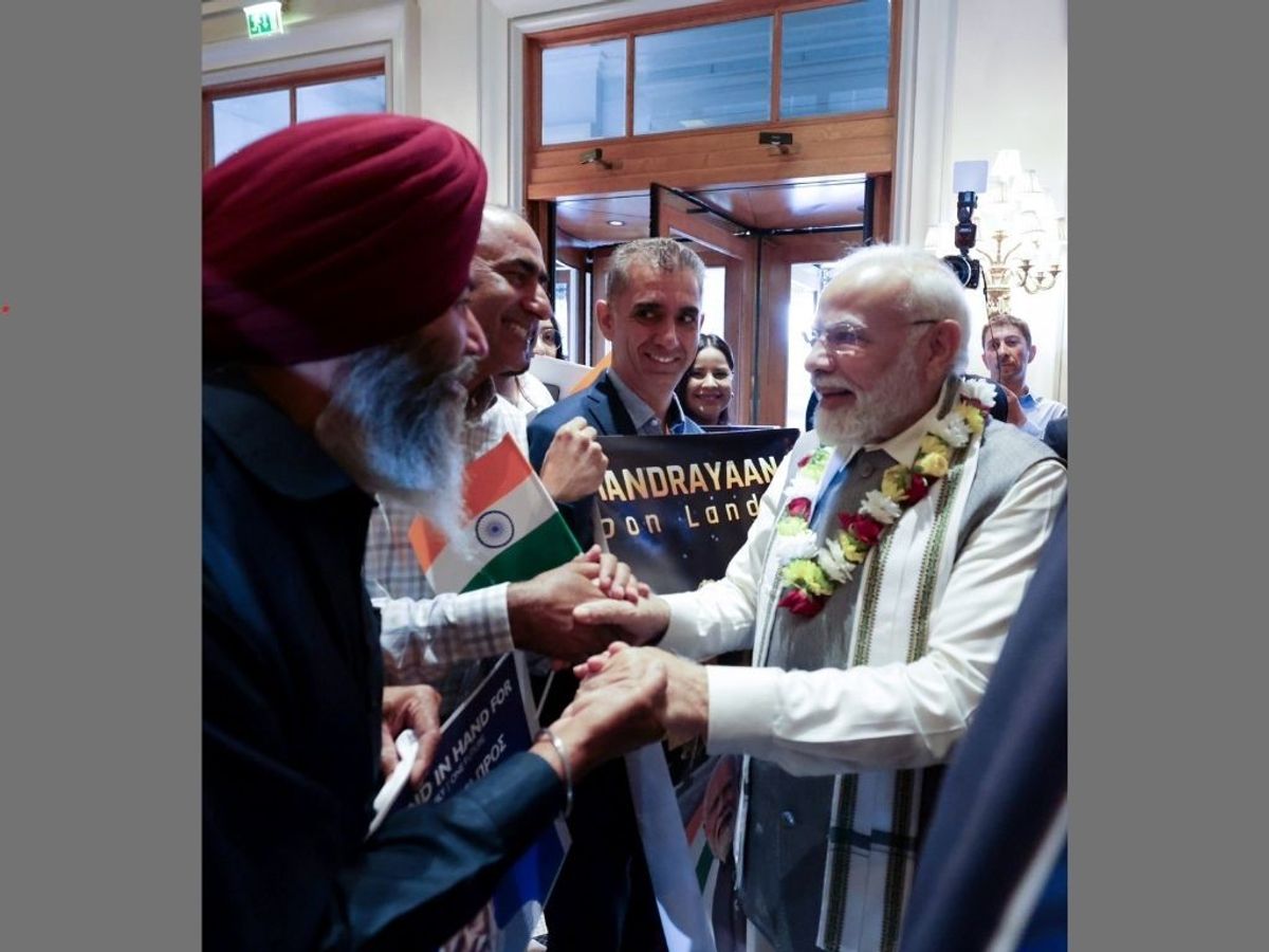 Indian prime minister Narendra Modi being welcomed by members of the Indian diaspora on his arrival at Hotel Grande Bretagne, in Athens, Greece