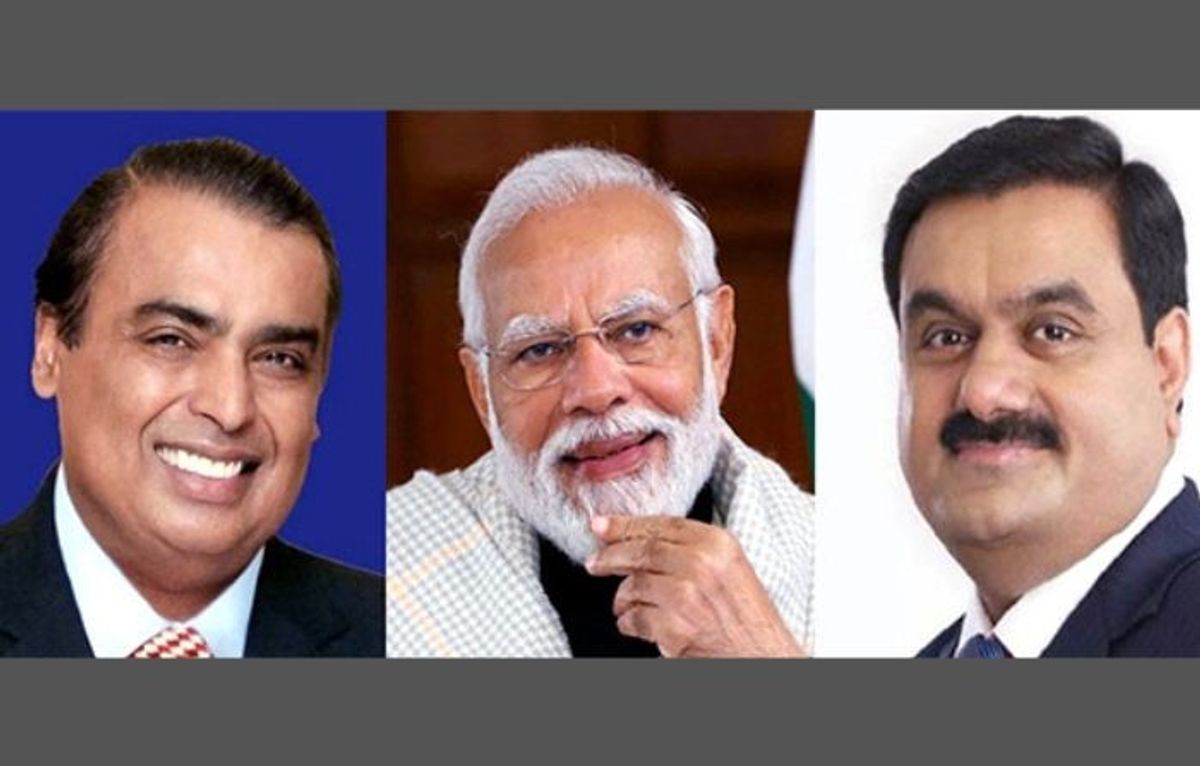 Indian prime minister Narendra Modi (C) with Indian industrialists Mukesh Ambani (L) and Gautam Adani