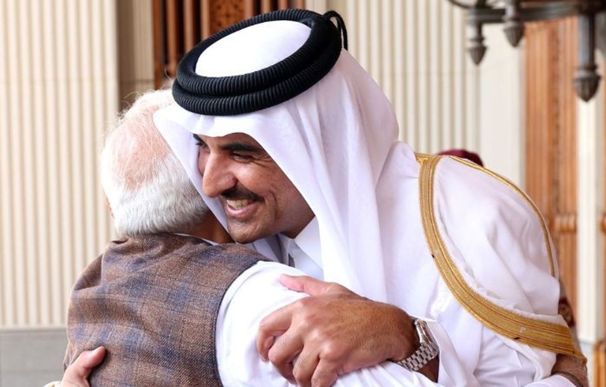 Indian prime minister Narendra Modi embraces the Emir of Qatar Sheikh Tamim bin Hamad Al Thani