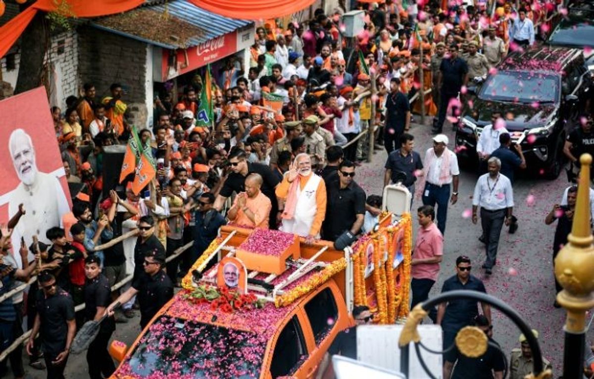 Indian prime minister Narendra Modi holds a roadshow in his parliamentary constituency Varanasi in the northern state of Uttar Pradesh on May 13, 2024.