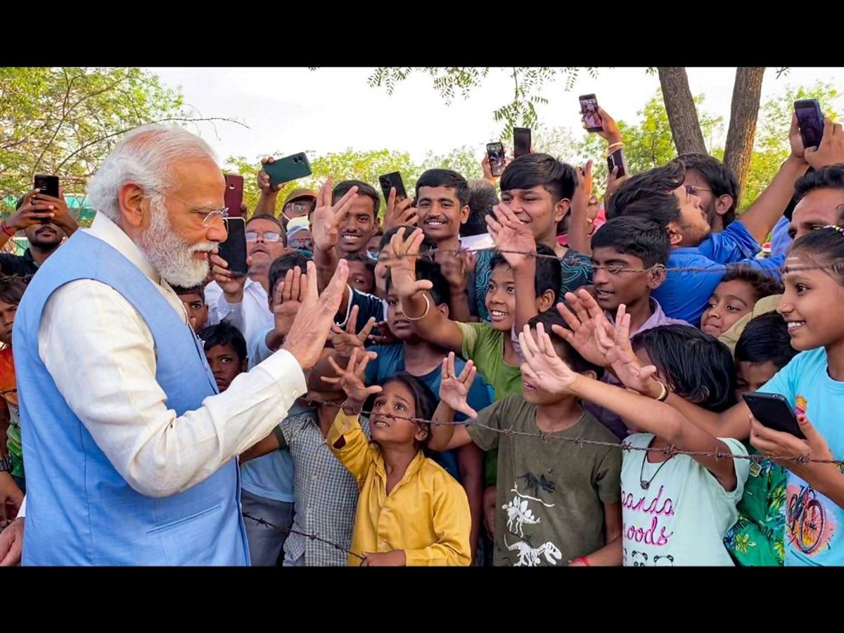 Indian prime minister Narendra Modi interacts with children in Kalaburagi in the poll-bound southern state of Karnataka