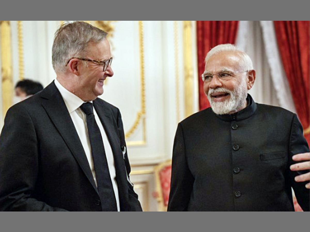 Indian prime minister Narendra Modi interacts with his Australian counterpart Anthony Albanese