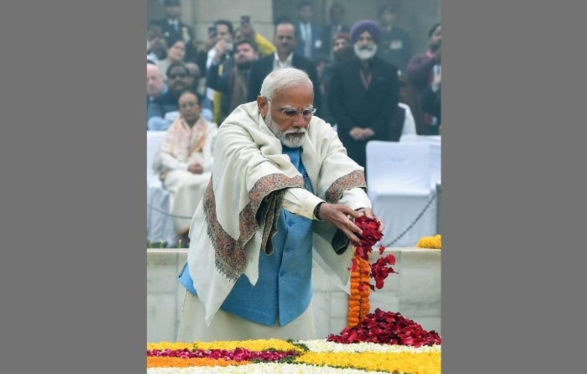 Indian prime minister Narendra Modi pays floral tribute to Mahatma Gandhi on his 76th death anniversary, at Raj Ghat in New Delhi