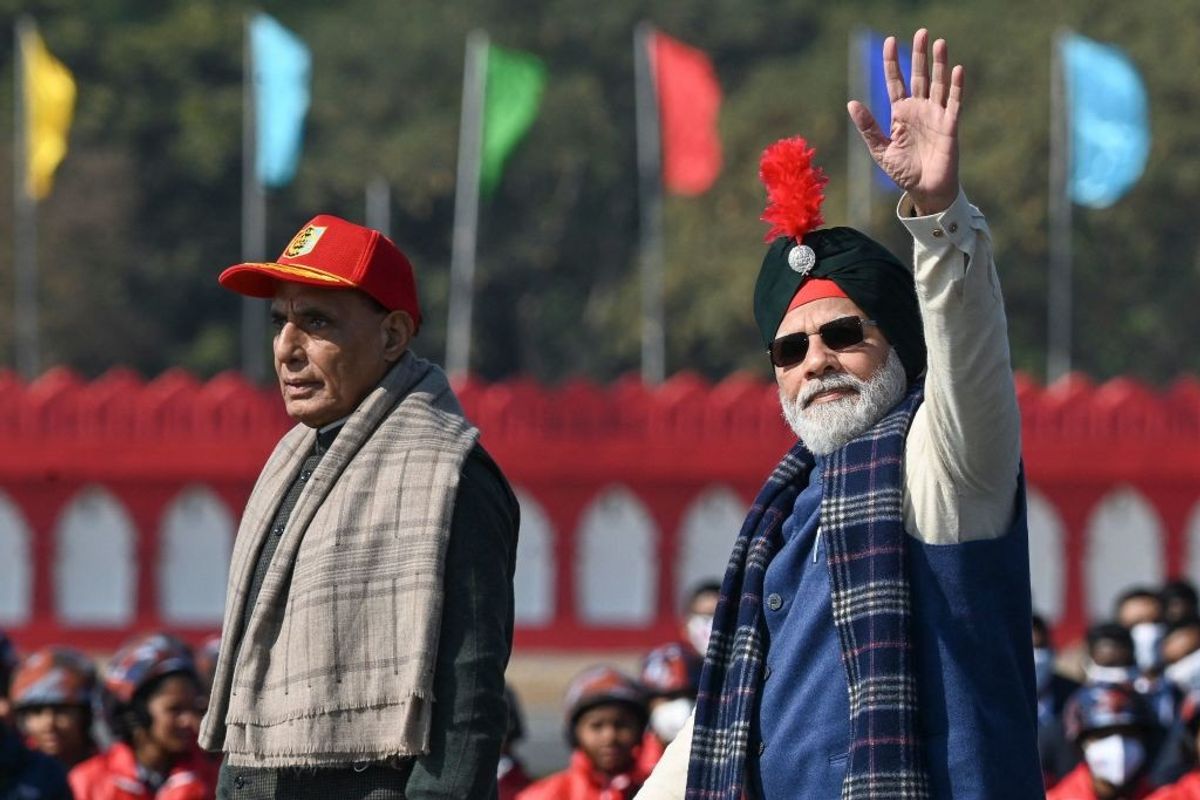 Indian prime minister Narendra Modi (R) with defence minister Rajnath Singh (L) at an NCC rally in New Delhi