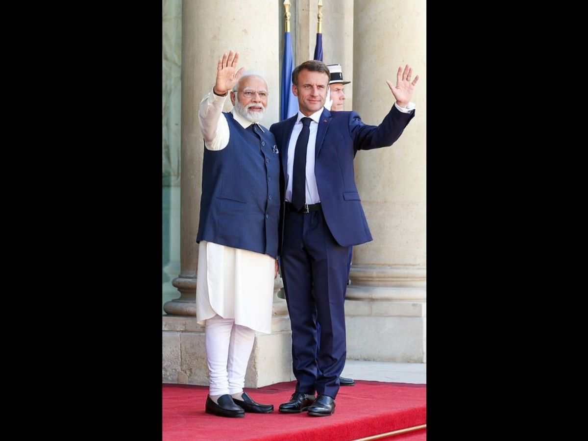 Indian prime minister Narendra Modi receives a warm welcome from French president Emmanuel Macron on his arrival at the Élysée Palace, in Paris