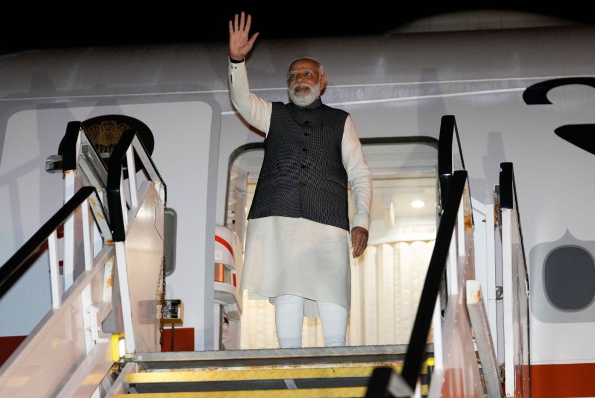 Indian prime minister Narendra Modi waves as he departs on May 24, 2023, from Sydney, Australia