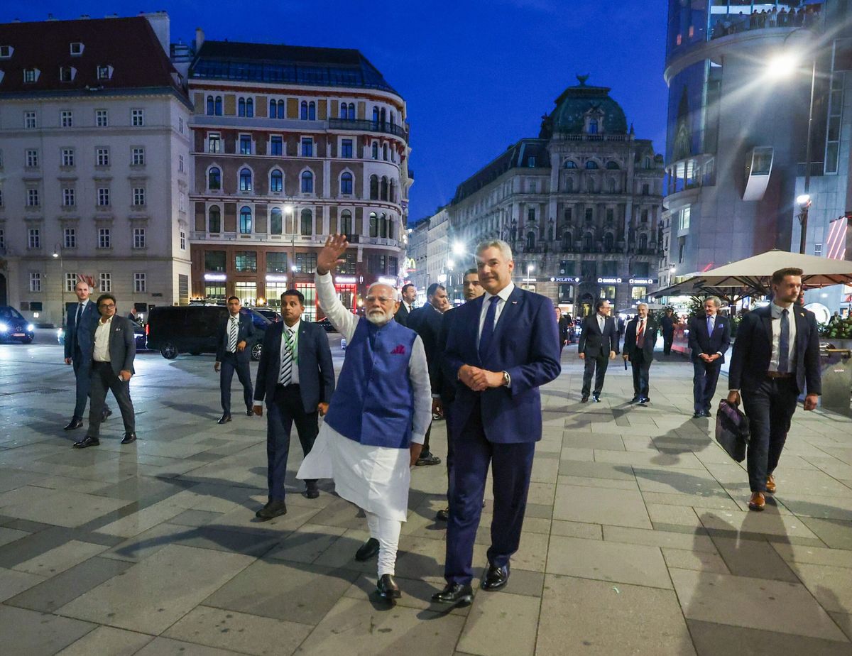 Indian prime minister Narendra Modi with Austrian chancellor Karl Nehammer (to his left) on his arrival for a private dinner in Vienna