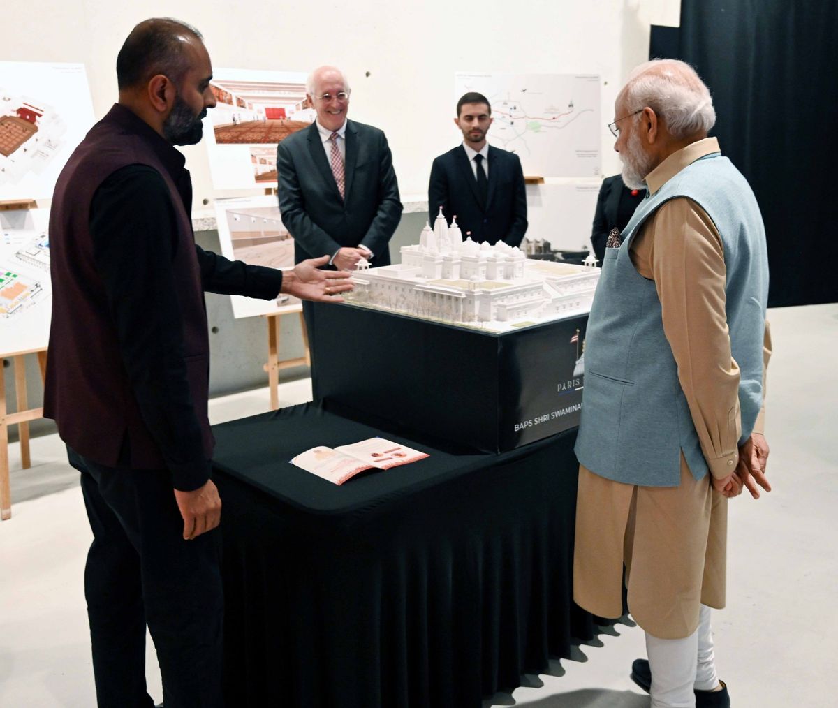 Indian prime minister Narendra Modi with BAPS volunteers and members of the architect of the upcoming temple in Paris, Arte Charpentier, during his recent visit to France in July 2023.