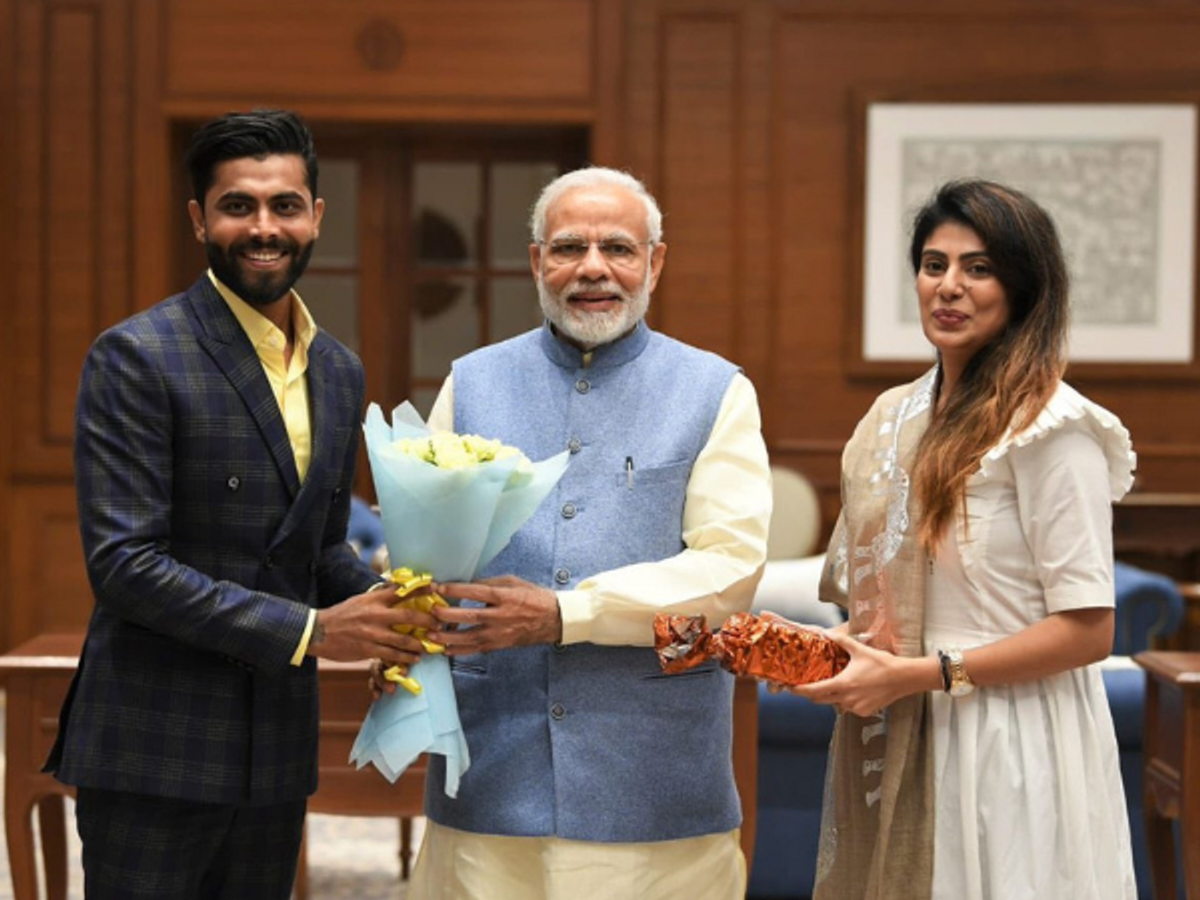 Indian prime minister Narendra Modi with India cricketer Ravindra Jadeja and his wife Rivaba Jadeja