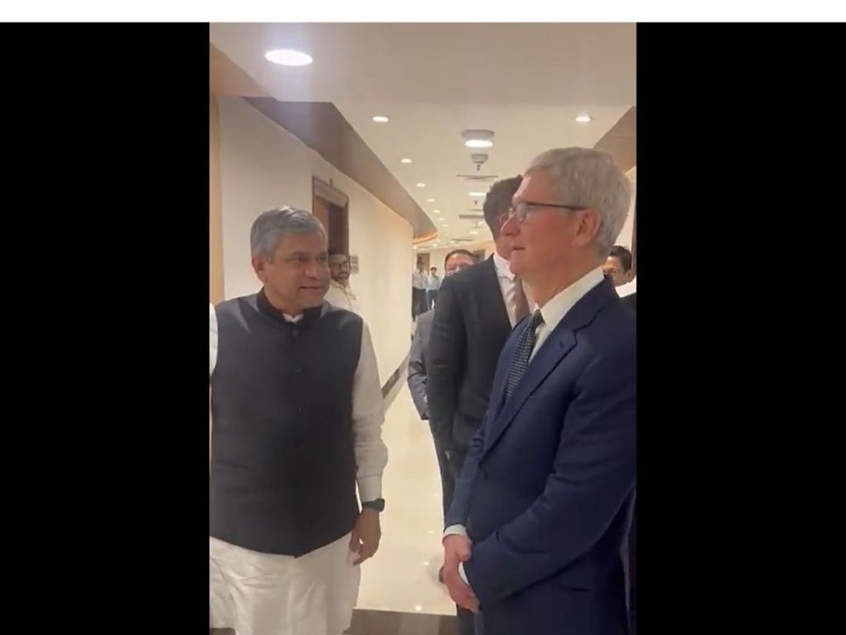 Indian railways minister Ashwini Vaishnaw (L) shows Apple CEO Tim Cook the world's highest bridge in Jammu and Kashmir, in New Delhi on Wednesday,