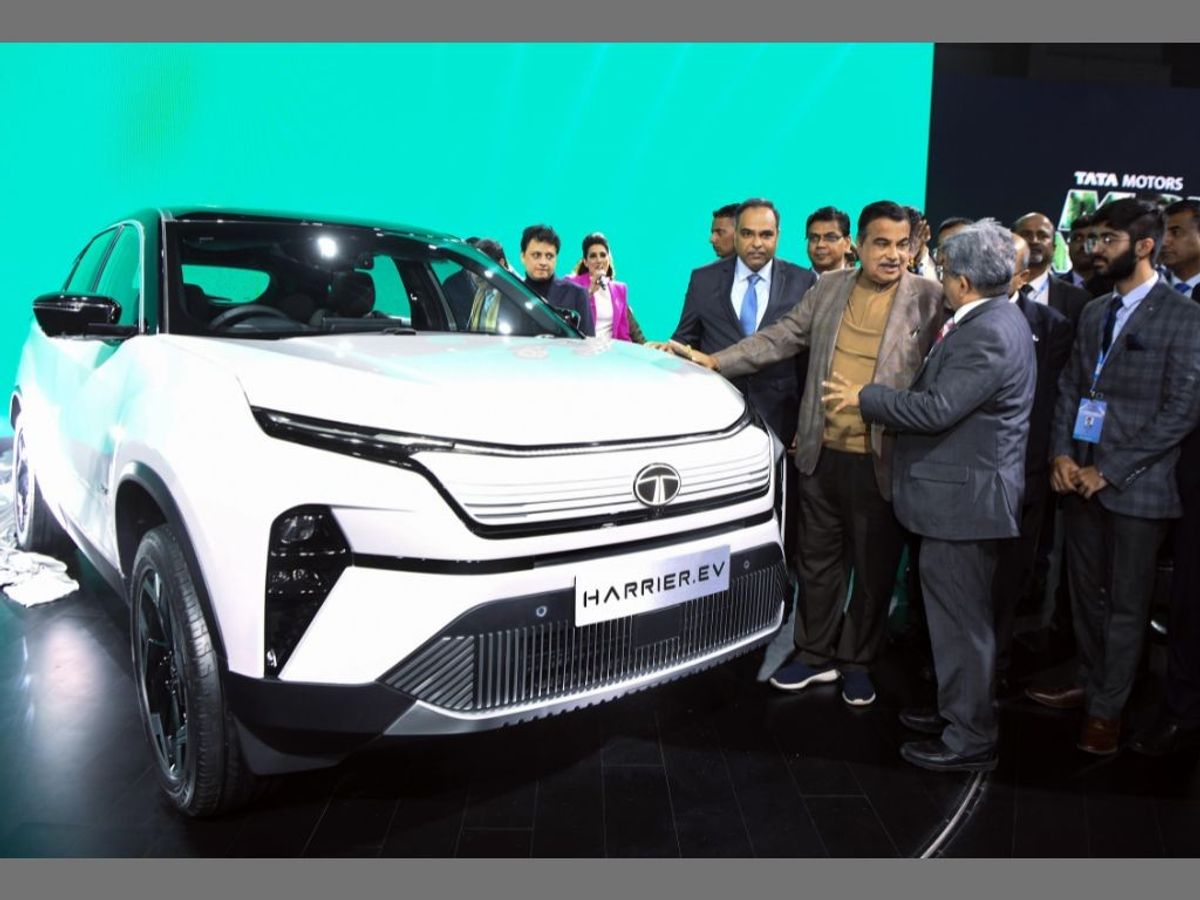 Indian road transport and highways minister Nitin Gadkari (third from right) inspects an electric vehicle during the inaugural ceremony of Auto Expo 2023