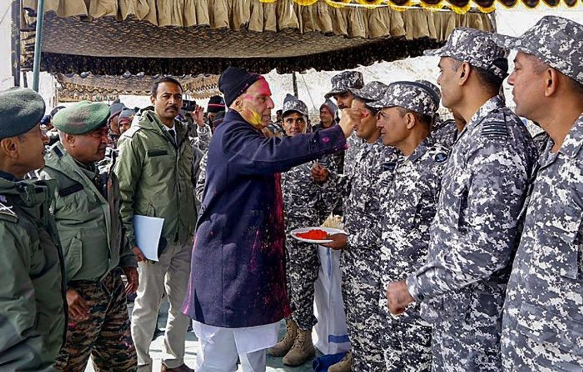 Indiann defence minister Rajnath Singh plays Holi with Indian Army personnel in Leh, Ladakh.