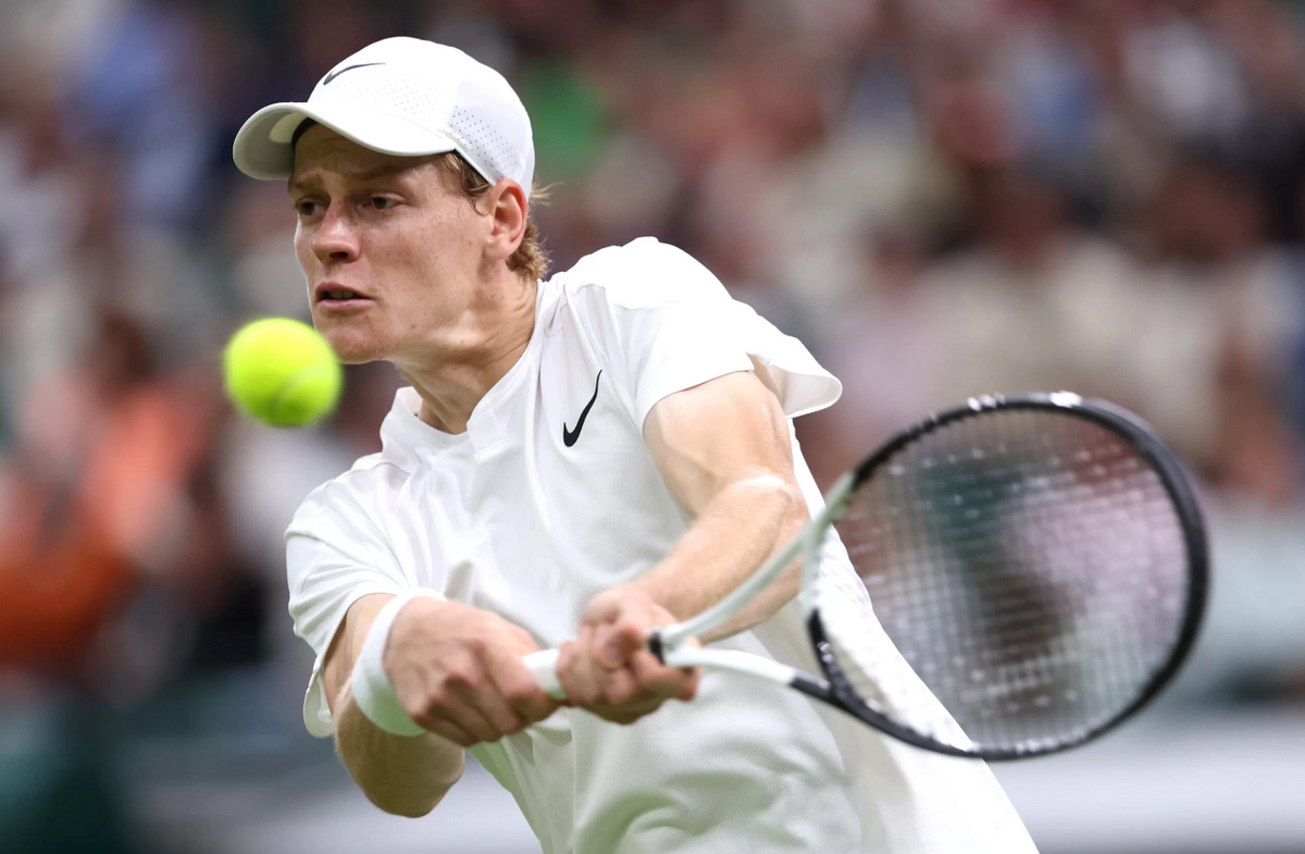 Jannick Sinner of Italy plays a shot in Wimbledon 2024