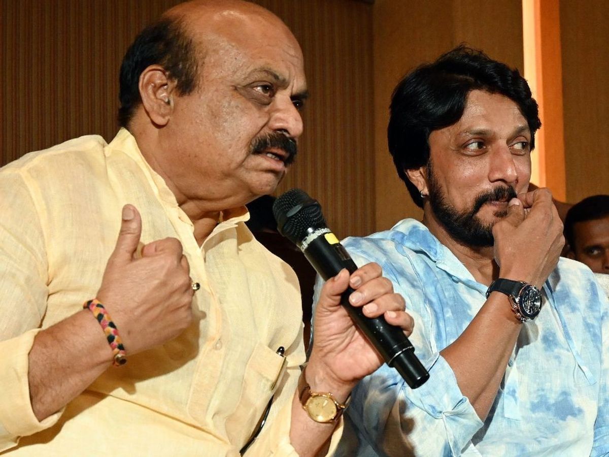 Karnataka chief minister Basavaraj Bommai (L) and actor Kichcha Sudeep