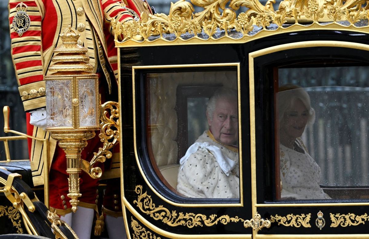 King Charles III and Queen Camilla arrive in the Diamond Jubilee State Coach from Buckingham Palace to Westminster Abbey to the Coronation of King Charles III and Queen Camilla on May 6, 2023 in London, England.