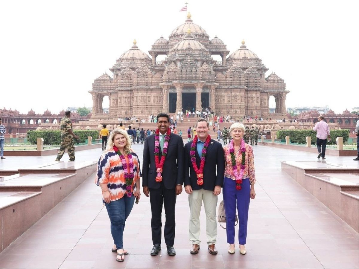 (L-R) US Congresswoman Kat Cammack, Ro Khanna, Michael Waltz and Congresswoman Deborah Ross pose for a picture in front of Swaminarayan Akshardham in New Delhi.