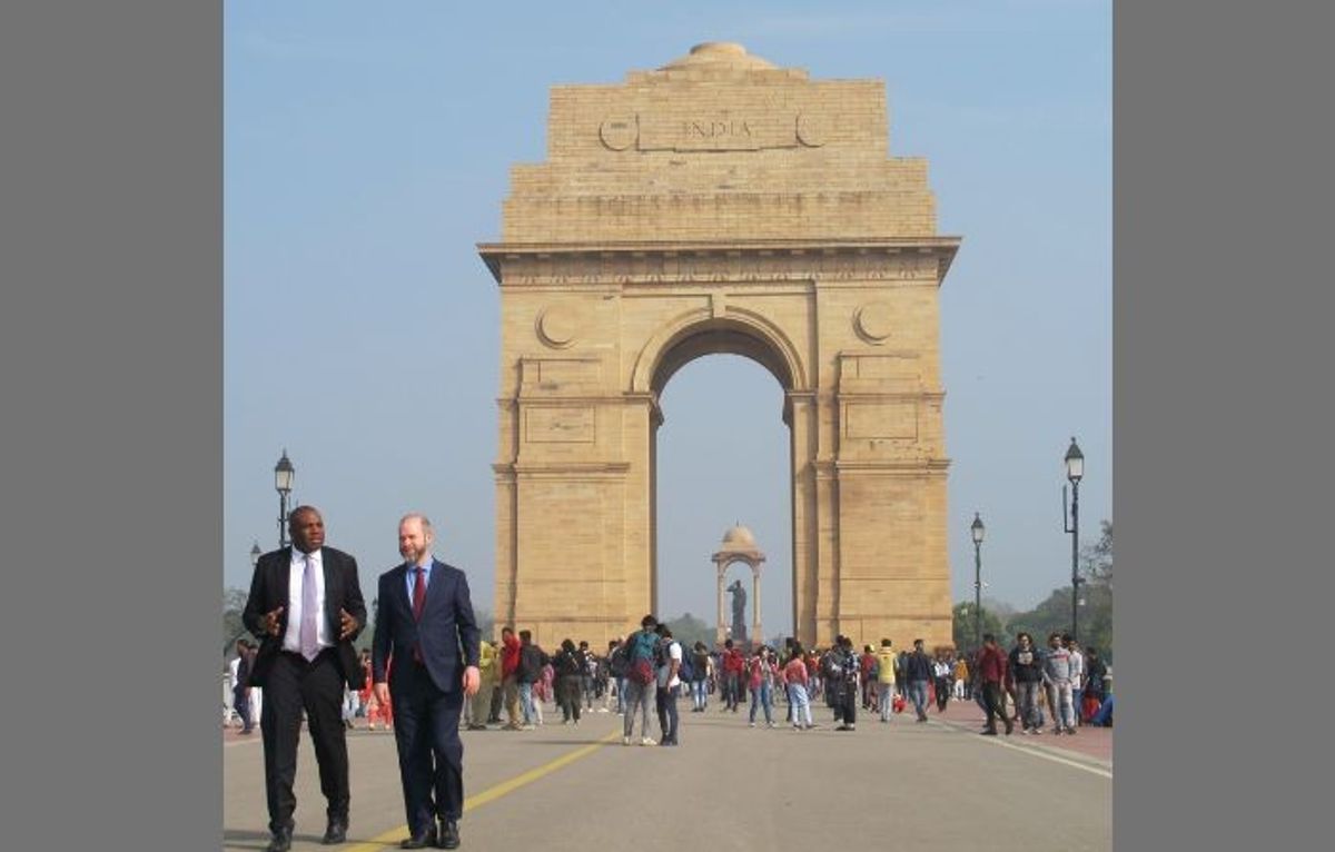Labour MPs David Lammy (L) and Jonathan Reynolds walk in front of India Gate in New Delhi, India.