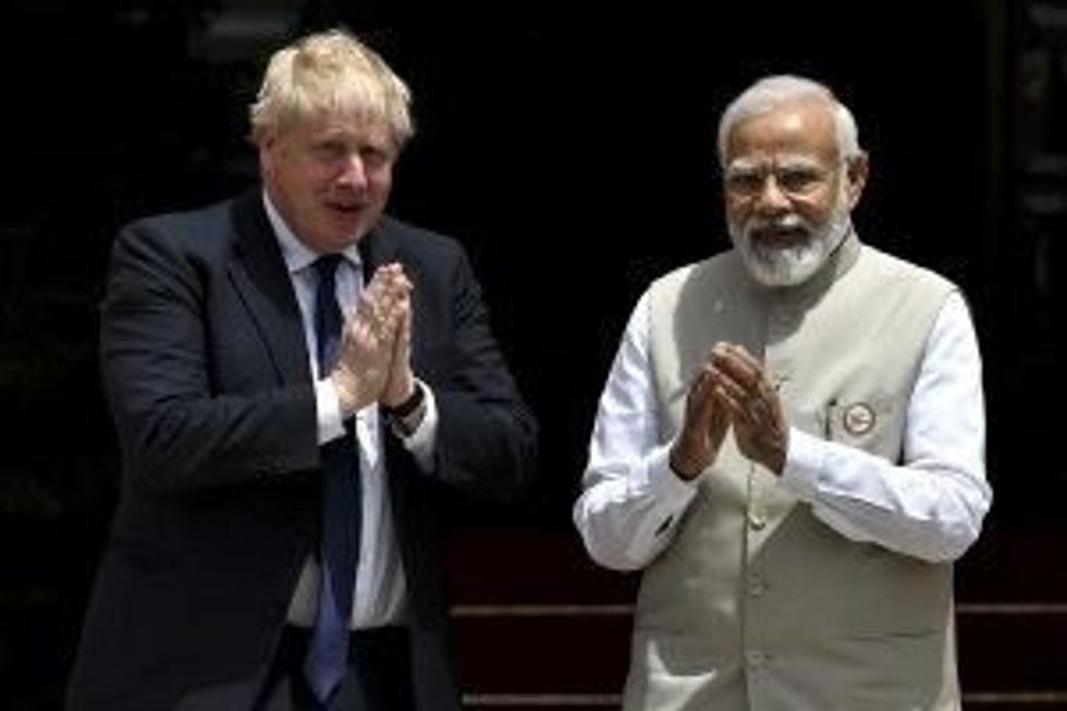 LEAD 1 INSET 1 Johnson Modi India GettyImages 1240143658