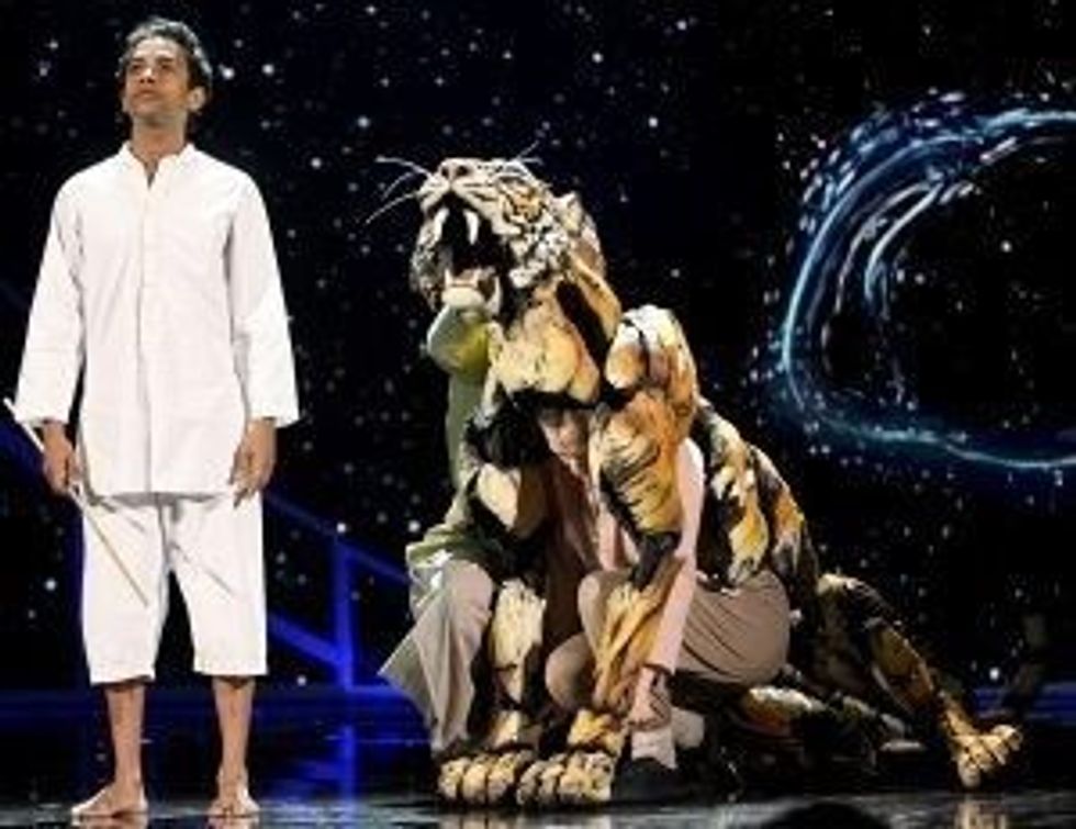 LEAD Life of Pi INSET Pi with tiger GettyImages 1390700957