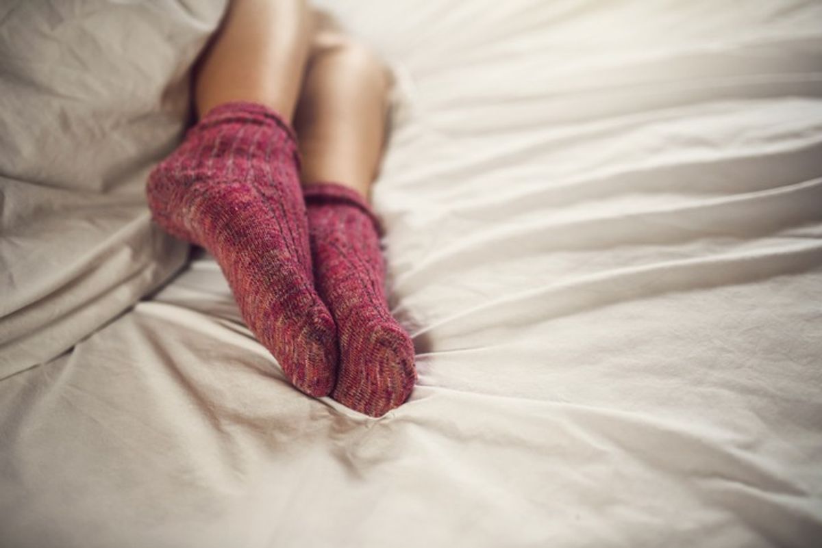 Is sleeping with your socks on safe? Here’s what experts say