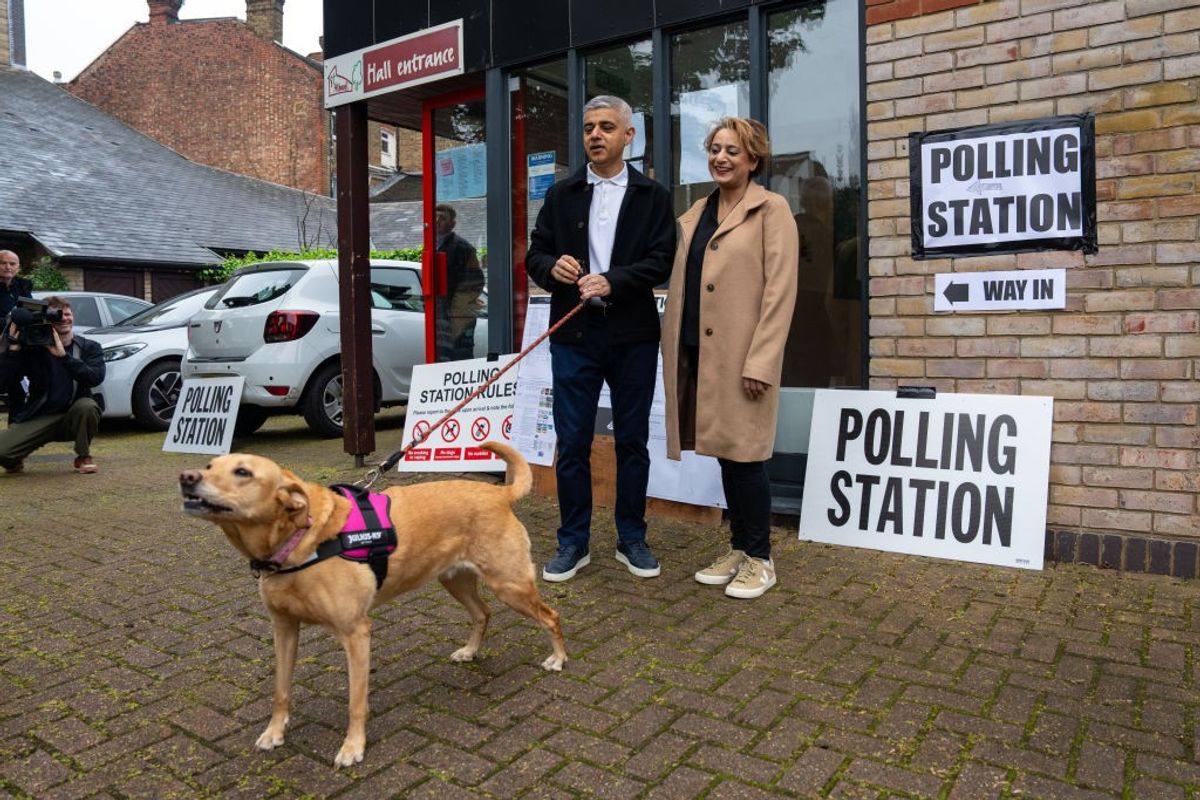 London mayor Sadiq Khan and his wife Saadiya arrive with their dog Luna to cast their vote in the London mayoral election on May 2, 2024 in London, UK.
