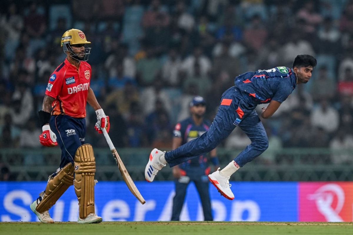 Lucknow Super Giants' Mayank Yadav bowls against Punjab Kings in IPL 2024