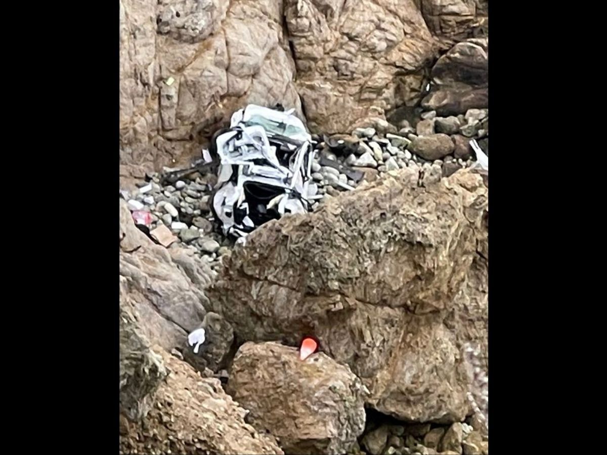 Mangled remains of the Tesla car that fell off a cliff in the US.