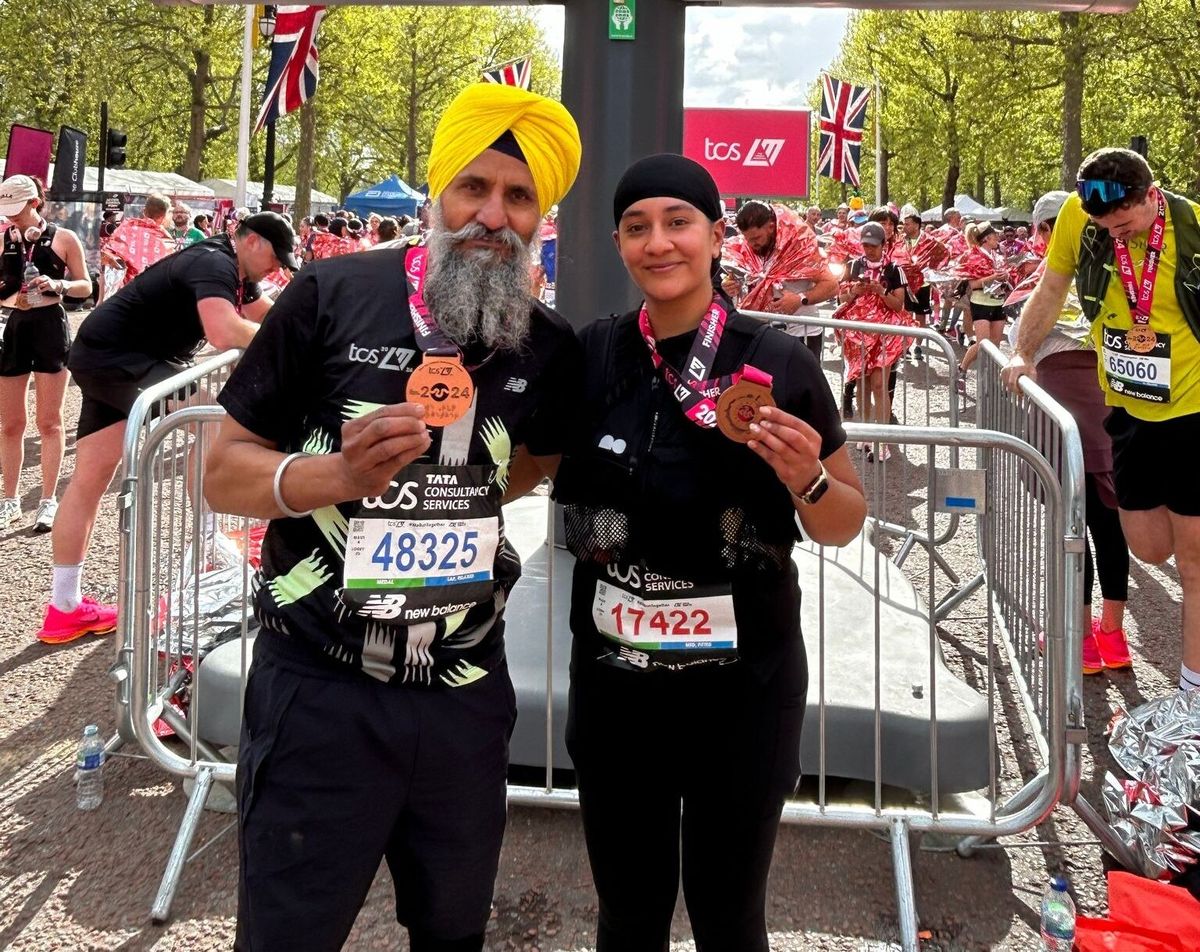 Fauja Singh-inspired father completes London marathon with daughter